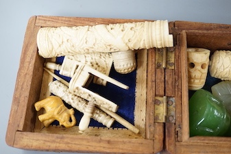 A group of 19th century ivory carvings, carved mineral buddha, monkey etc